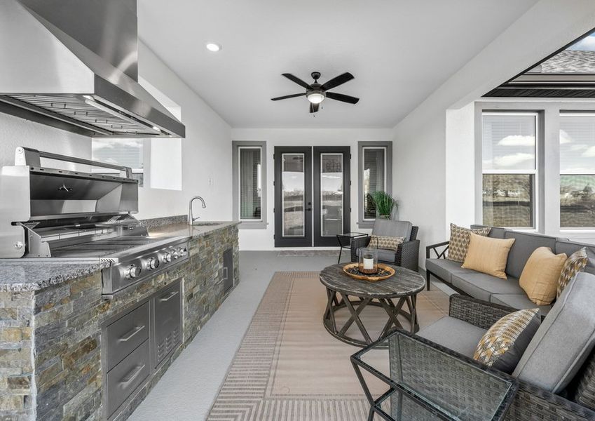 Take the entertaining outdoors with a covered outdoor living space and kitchen.