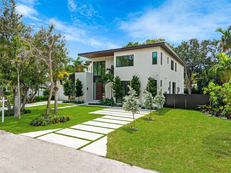 Front exterior of a new home in , Miami Shores, FL, highlighting curb appeal (Image 29). Front exterior of a new home in , Miami Shores, FL, highlighting curb appeal (Image 29).