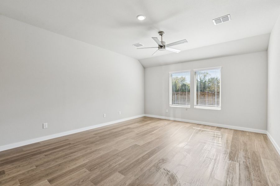 Living Room in the Heisman home plan by Trophy Signature Homes – REPRESENTATIVE PHOTO Living Room in the Heisman home plan by Trophy Signature Homes – REPRESENTATIVE PHOTO