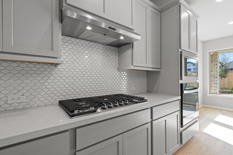 Furnished interior view inside a new home in Bridgeland 55', Cypress (Image 12).