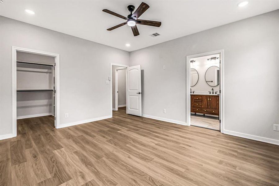 Primary bedroom with en-suite bath and large closet.