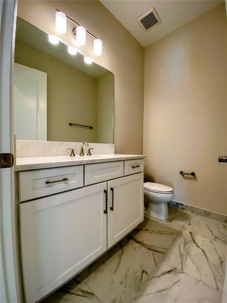 Furnished interior view inside a new home in Valencia Ridge (55+), Wesley Chapel (Image 12).