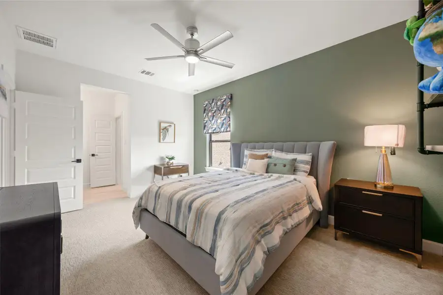 Furnished interior view inside a new home in Bridgeland, Cypress (Image 26).