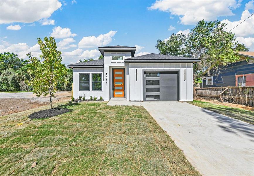 Front exterior of a new home in , Dallas, TX, highlighting curb appeal (Image 17).