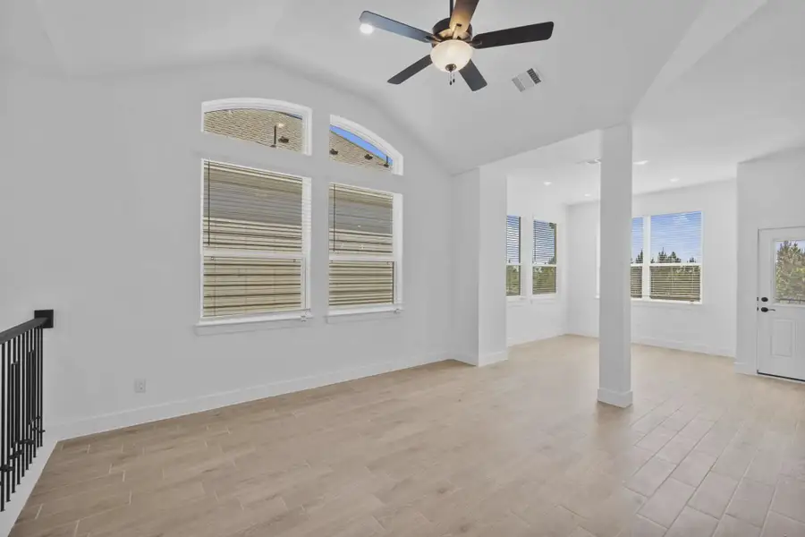 Representative unfurnished interior of a home built from the Margaux by Chesmar Homes in Bridgeland Chateau, Cypress (Image 21).