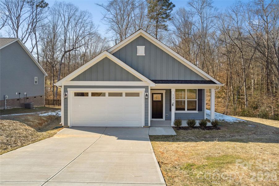 Front exterior of a new home in , Lincolnton, NC, highlighting curb appeal (Image 1). Front exterior of a new home in , Lincolnton, NC, highlighting curb appeal (Image 1).