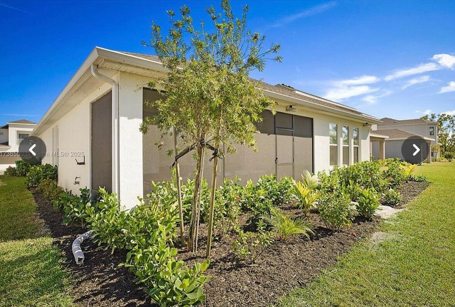 Front exterior of a new home in , Port St. Lucie, FL, highlighting curb appeal (Image 1).