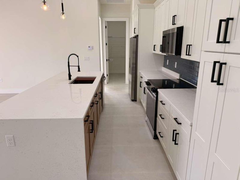 Furnished interior view inside a new home in , Port Charlotte (Image 10). Furnished interior view inside a new home in , Port Charlotte (Image 10).