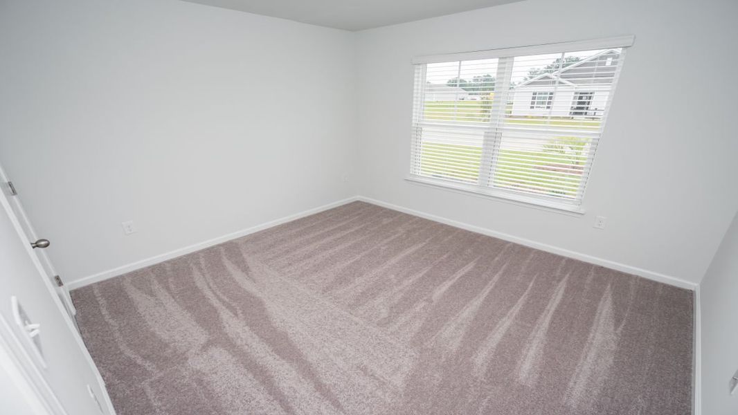 Representative unfurnished interior of a home built from the ARIA by D.R. Horton in The Meadows at Wildwood Village, Shallotte (Image 13). Representative unfurnished interior of a home built from the ARIA by D.R. Horton in The Meadows at Wildwood Village, Shallotte (Image 13).