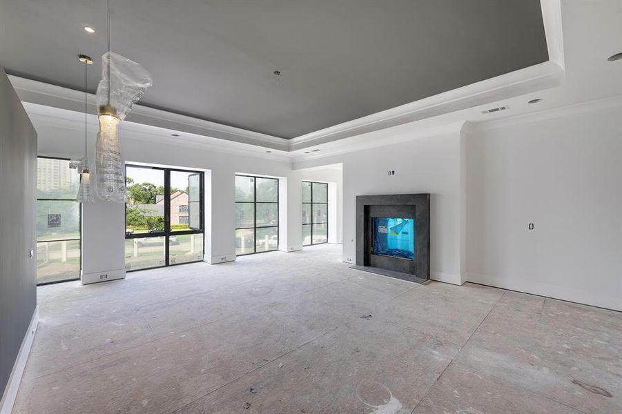 Another view of the spacious primary suite looking towards the street. Stage of construction as of April 17, 2025. Another view of the spacious primary suite looking towards the street. Stage of construction as of April 17, 2025.