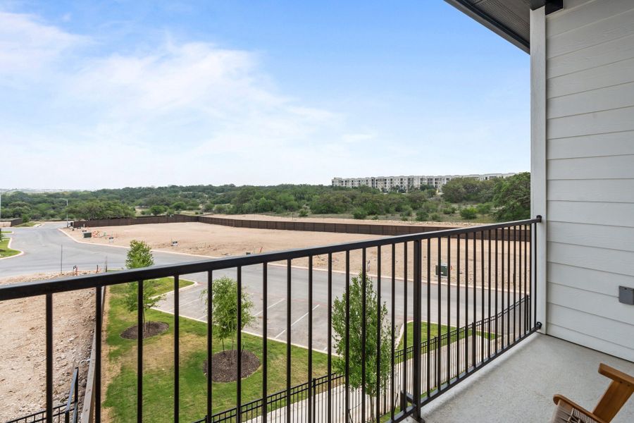 Exterior details and patio area of a home in Centero at Stone Oak, San Antonio (Image 25).