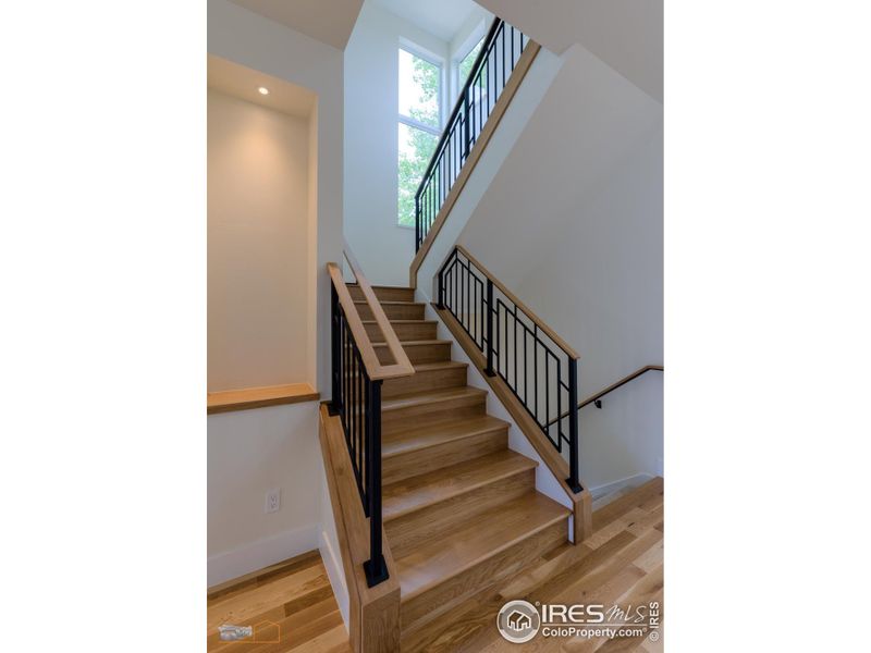 Wood Stairway With Custom Metal Railing