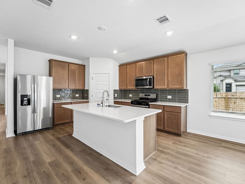 Furnished interior view inside a new home in Butler Farms - Boulevard Collection, Liberty Hill (Image 4).