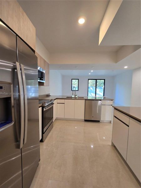 Furnished interior view inside a new home in , Dania Beach (Image 6).