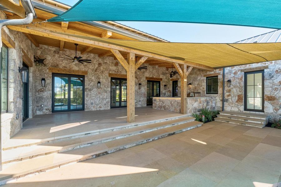 Exterior details and patio area of a home in , Dripping Springs (Image 28).