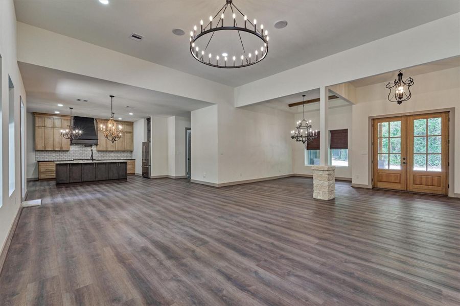 This open-concept floorplan is ideal for entertaining family and friends, offering seamless flow between the living spaces while creating and inviting atmosphere in this peaceful retreat