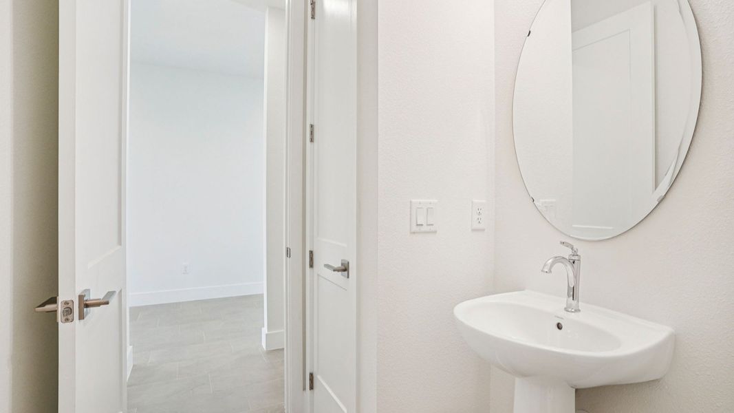 Plumeria Floor Plan first floor half bathroom with a linen closet by DRB Homes in Trailside located in Mount Dora, FL Plumeria Floor Plan first floor half bathroom with a linen closet by DRB Homes in Trailside located in Mount Dora, FL