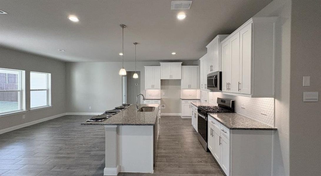 Kitchen - All Home and community information, including pricing, included features, terms, availability and amenities, are subject to change at any time without notice or obligation. All Drawings, pictures, photographs, video, square footages, floor plans, elevations, features, colors and sizes are approximate for illustration purposes only and will vary from the homes as built.