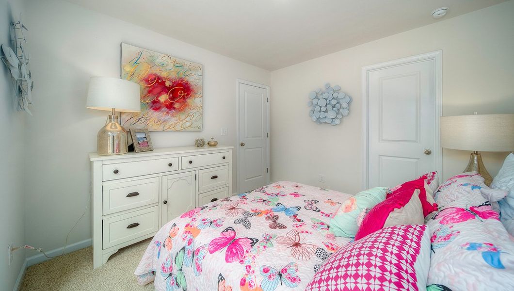 Furnished interior view inside a new home in Townes at Tap Root Farms, Fletcher (Image 31). Furnished interior view inside a new home in Townes at Tap Root Farms, Fletcher (Image 31).