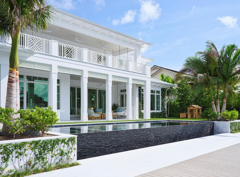 Front exterior of a new home in , North Palm Beach, FL, highlighting curb appeal (Image 29). Front exterior of a new home in , North Palm Beach, FL, highlighting curb appeal (Image 29).