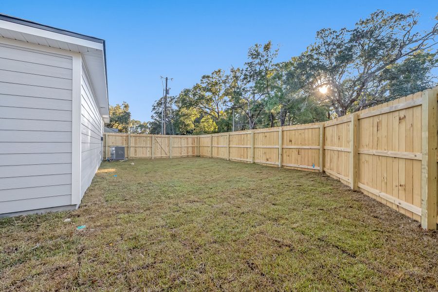 Exterior details and patio area of a home in Live Oak Cottages, Freeport (Image 28). Exterior details and patio area of a home in Live Oak Cottages, Freeport (Image 28).