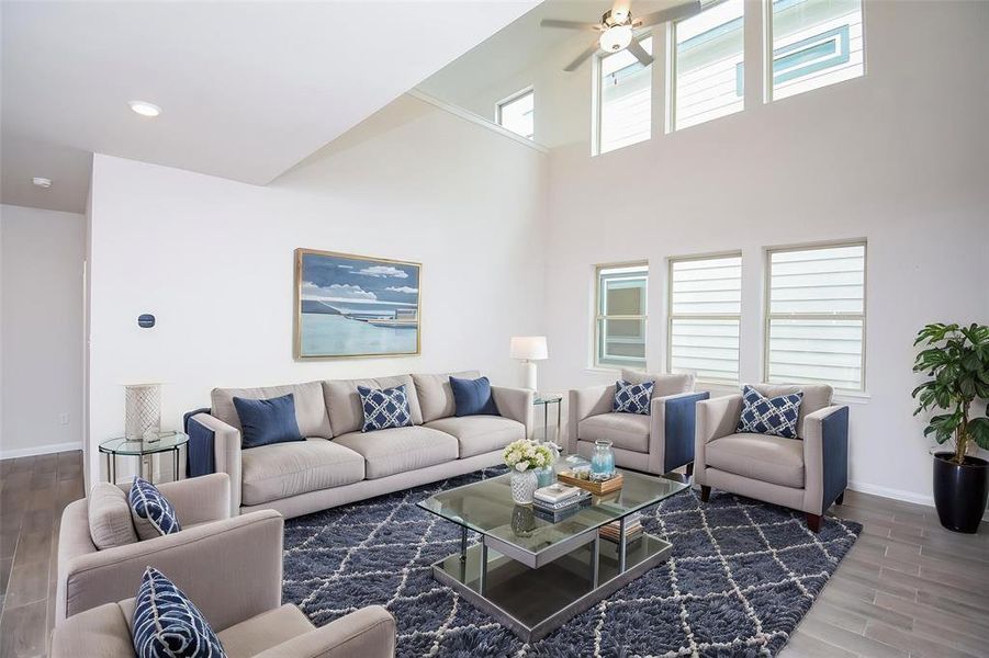The soaring ceilings create an airy and expansive feel, enhanced by natural light pouring in. The soaring ceilings create an airy and expansive feel, enhanced by natural light pouring in.