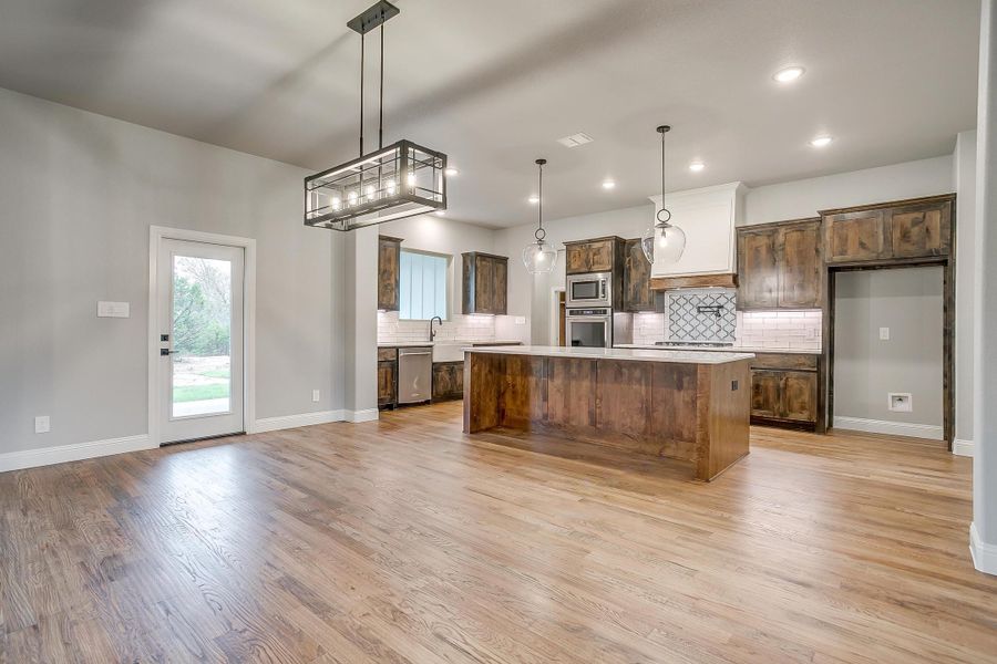 Representative furnished interior of a home built from the Pecan Grove by Trinity Classic Homes in The Reserve at Shadle, Poolville (Image 13). Representative furnished interior of a home built from the Pecan Grove by Trinity Classic Homes in The Reserve at Shadle, Poolville (Image 13).