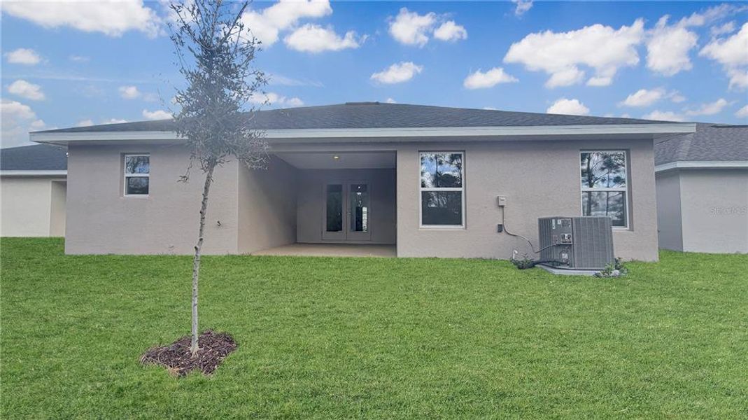 Exterior details and patio area of a home in Harmony Central, St. Cloud (Image 2). Exterior details and patio area of a home in Harmony Central, St. Cloud (Image 2).