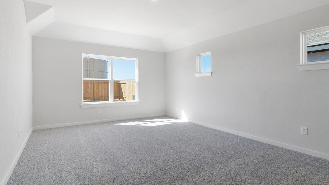 Representative furnished interior of a home built from the Blanton by Brightland Homes in Sunterra, Katy (Image 13).