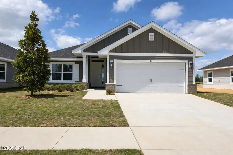 Front exterior of a new home in Parkbrook, Panama City, FL, highlighting curb appeal (Image 1). Front exterior of a new home in Parkbrook, Panama City, FL, highlighting curb appeal (Image 1).