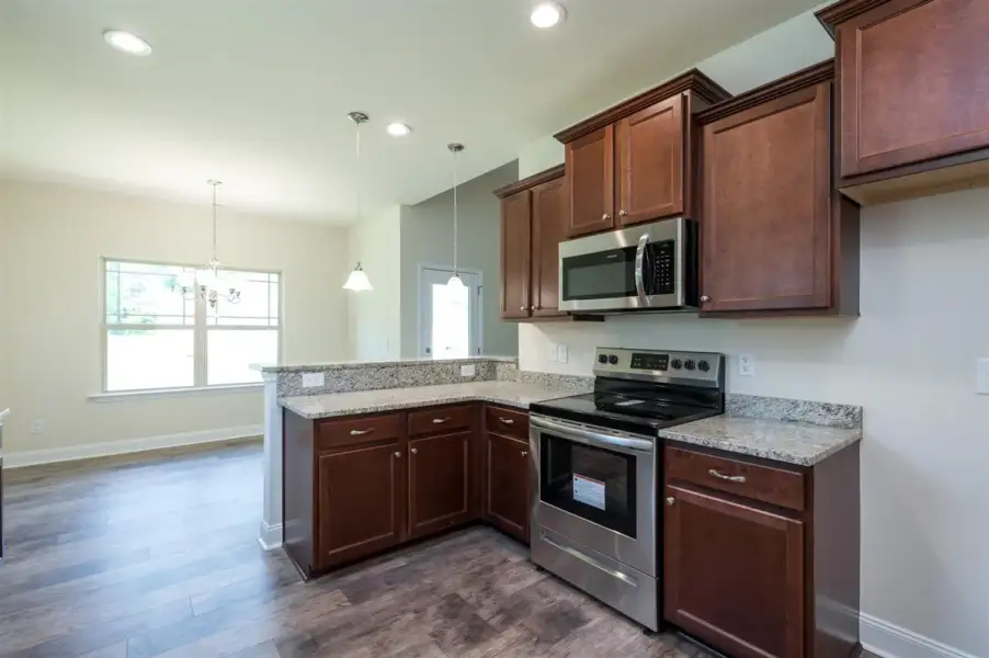 Representative furnished interior of a home built from the 1602-2 by Adams Homes in Ham Farm, La Grange (Image 5).