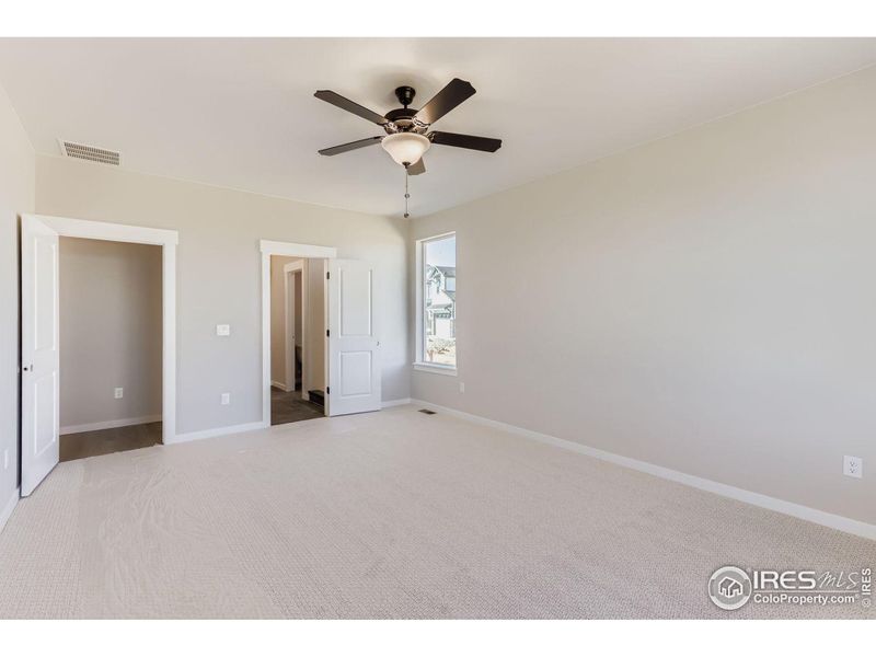 Spacious, unfurnished interior of a new home in Barefoot Lakes, Firestone (Image 22).