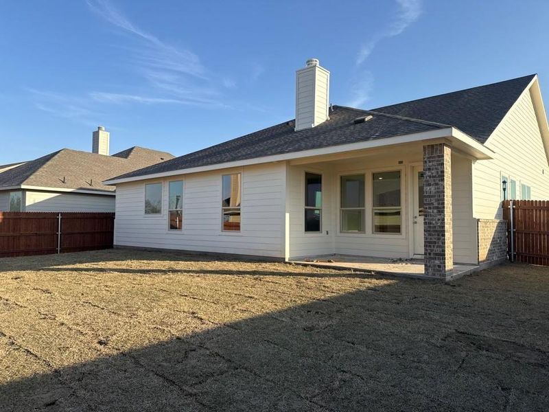 Exterior details and patio area of a home in Covenant Park, Springtown (Image 3).