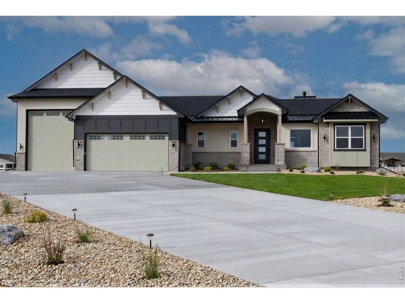 Front exterior of a new home in , Severance, CO, highlighting curb appeal (Image 26).