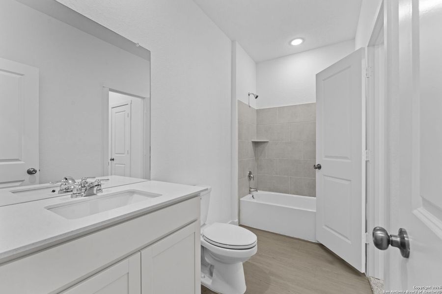 Furnished interior view inside a new home in Voss Farms, New Braunfels (Image 6).