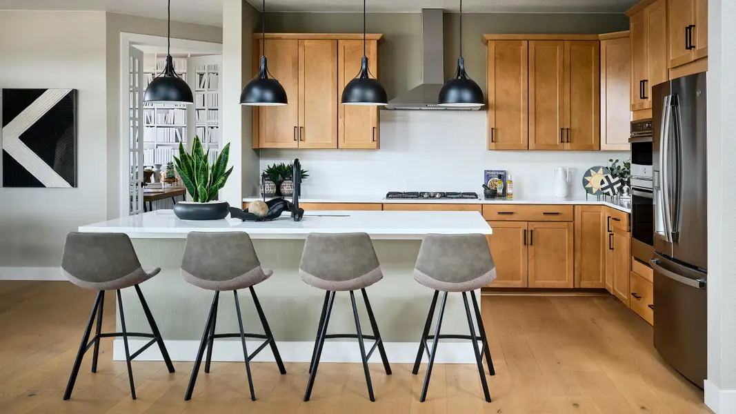 Representative furnished interior of a home built from the Roxborough by Taylor Morrison in Trailstone, Arvada (Image 4).