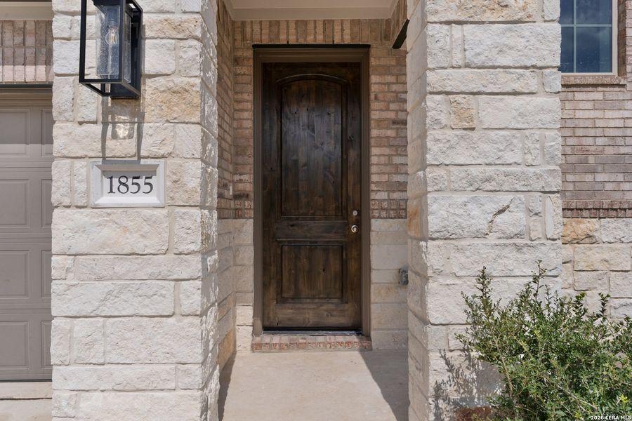 Exterior details and patio area of a home in Meyer Ranch - Enclave, New Braunfels (Image 15).