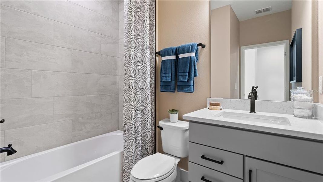 Furnished interior view inside a new home in Parkview at Hamlin, Winter Garden (Image 48).