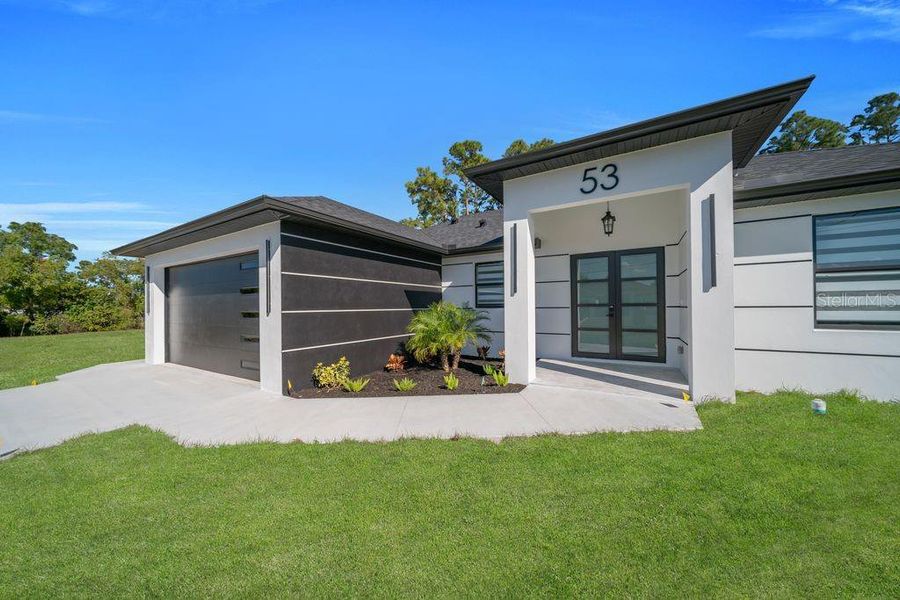 Exterior details and patio area of a home in , Lehigh Acres (Image 3).