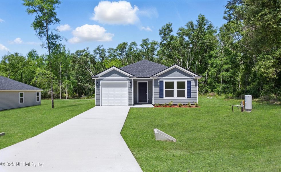 Front exterior of a new home in , Satsuma, FL, highlighting curb appeal (Image 26).