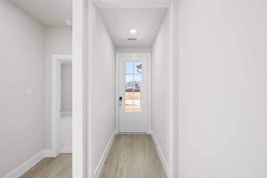 Spacious, unfurnished interior of a new home in The Meadows, Krum (Image 29).