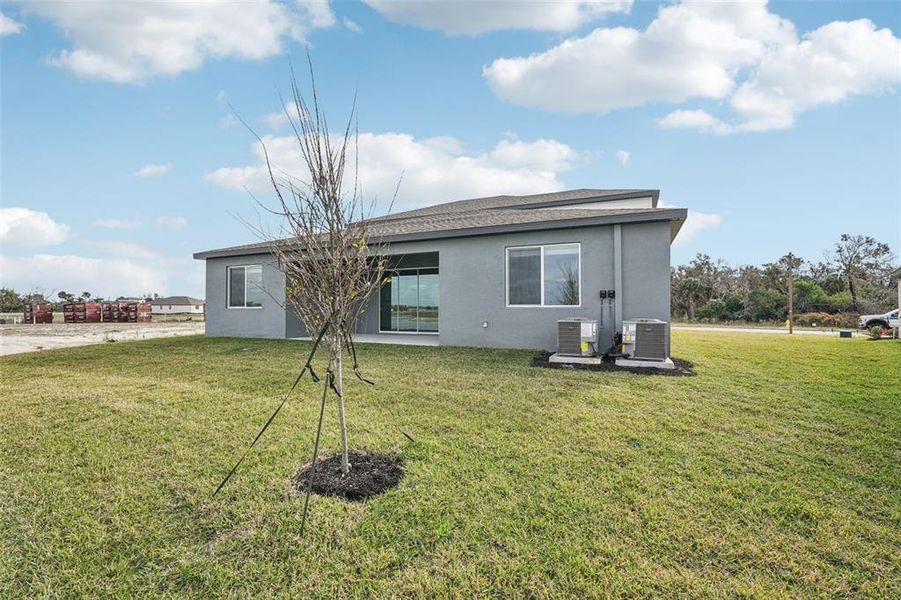 Exterior details and patio area of a home in Oakfield Trails - Signature Series, Parrish (Image 3).