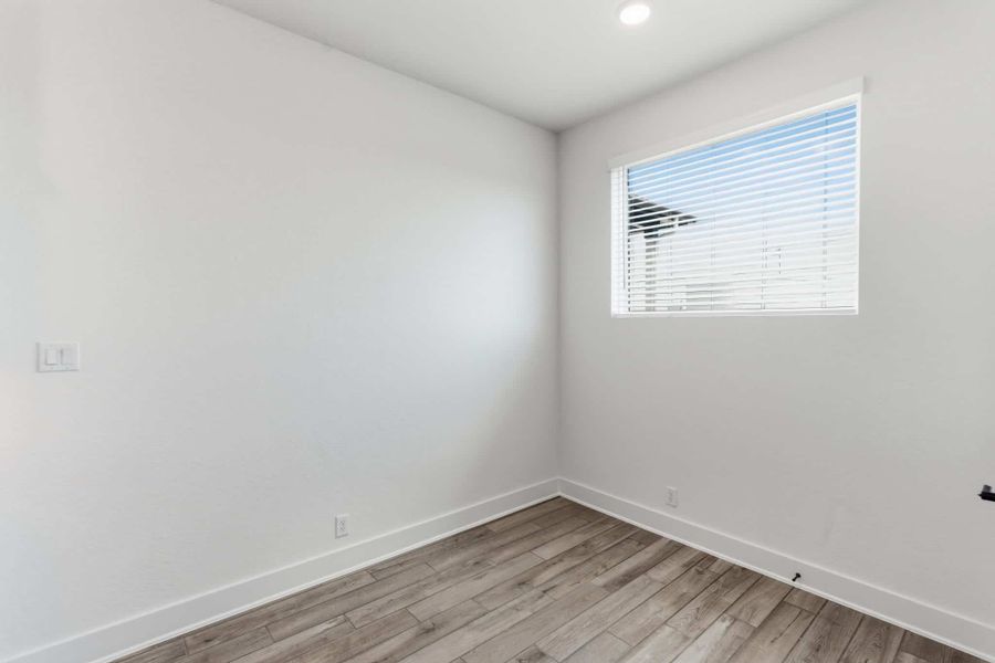 Spacious, unfurnished interior of a new home in Centero at Stone Oak, San Antonio (Image 24).