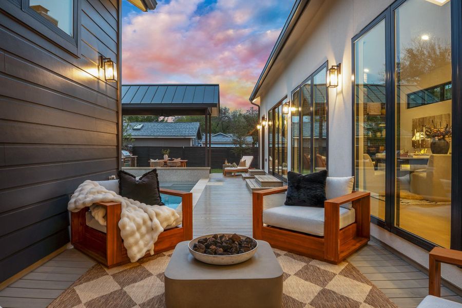 View of patio / terrace featuring an outdoor living space with a fire pit and a wooden deck