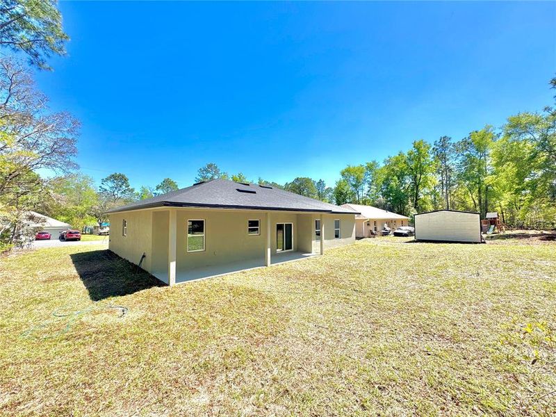 Exterior details and patio area of a home in , Citrus Springs (Image 20).