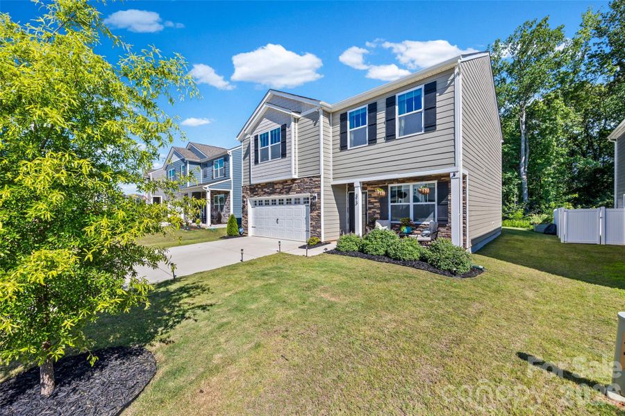 Front exterior of a new home in Fergus Crossing, York, SC, highlighting curb appeal (Image 22).