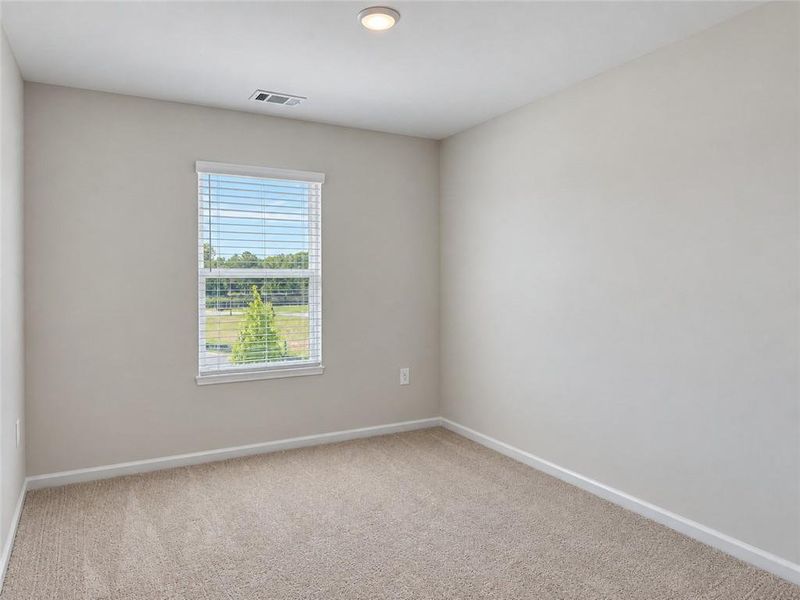 Spacious, unfurnished interior of a new home in Lake Carlton, Loganville (Image 10).