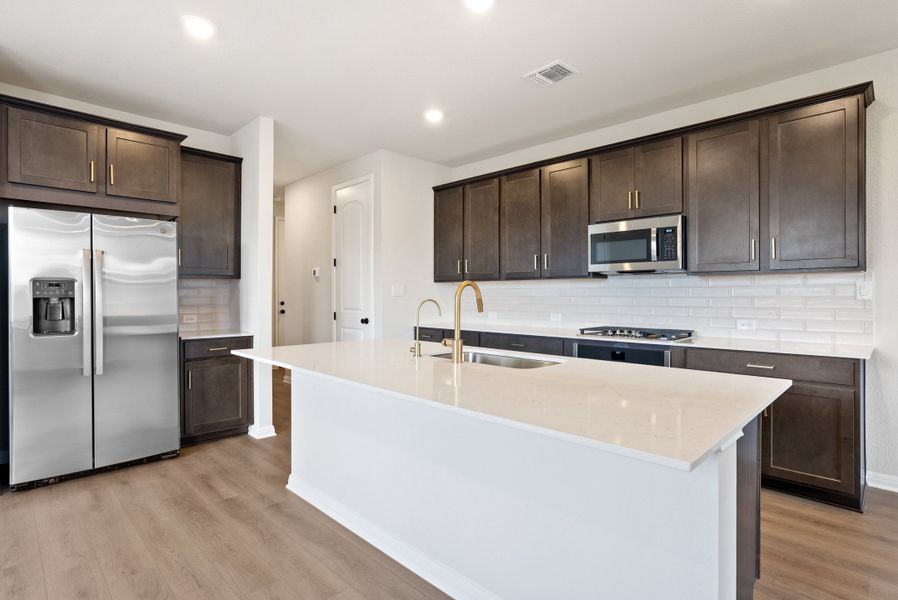 Representative furnished interior of a home built from the Texoma by Ashton Woods in The Colony 50s, Bastrop (Image 4).