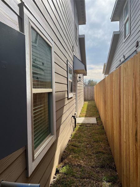 Exterior details and patio area of a home in , Houston (Image 1).