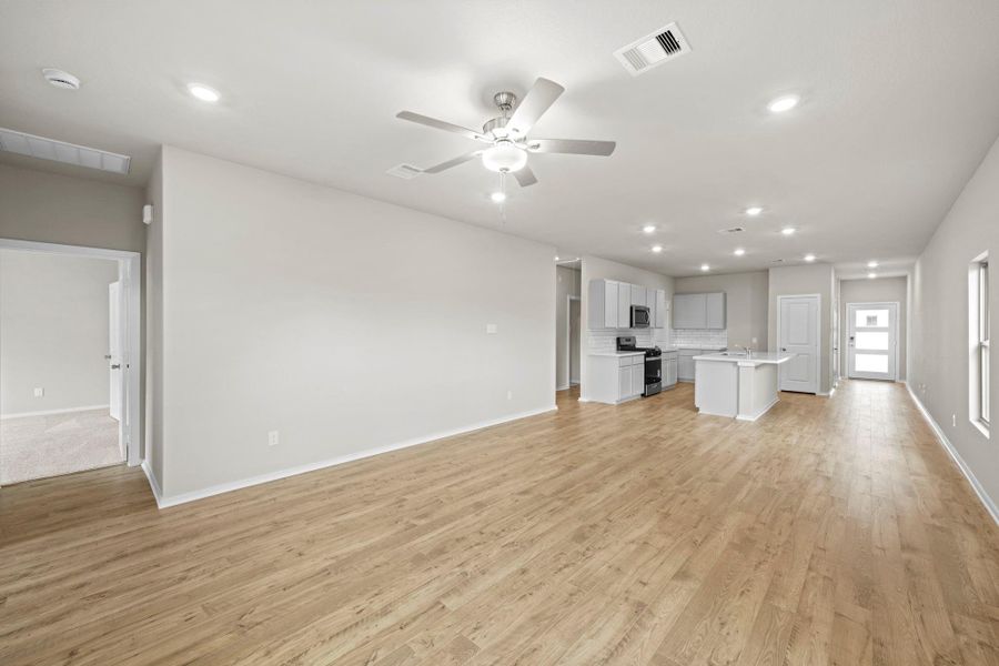 Spacious, unfurnished interior of a new home in Windrose Green, Angleton (Image 24).